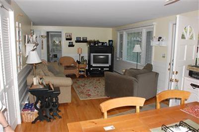 5 Forest Road Mashpee, MA 02649 - Photo 7 of 14 a living room with furniture and a fireplace