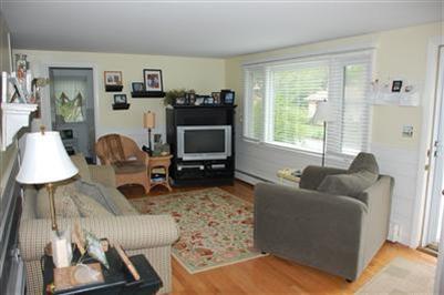 5 Forest Road Mashpee, MA 02649 - Photo 8 of 14 a living room with furniture and a window