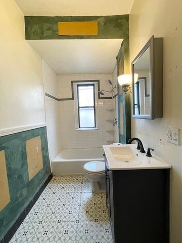 a view of balcony with furniture