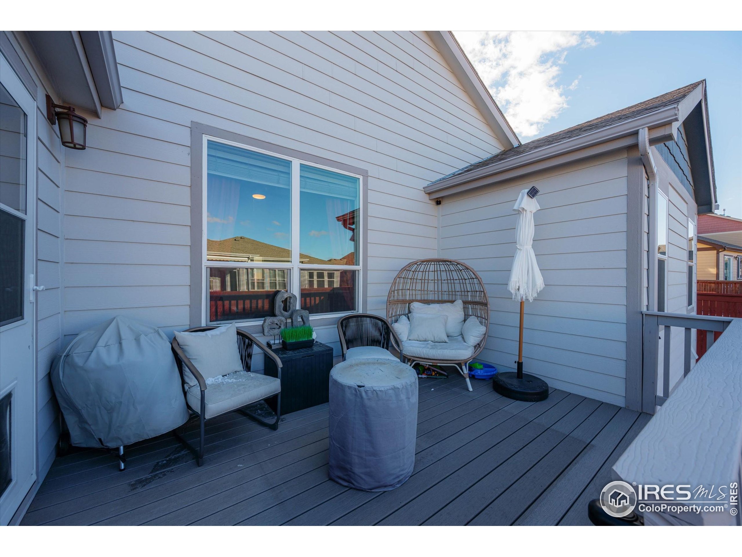 1995 Thundercloud Drive Windsor, CO 80550 - Photo 27 of 36 a backyard of a house with seating space