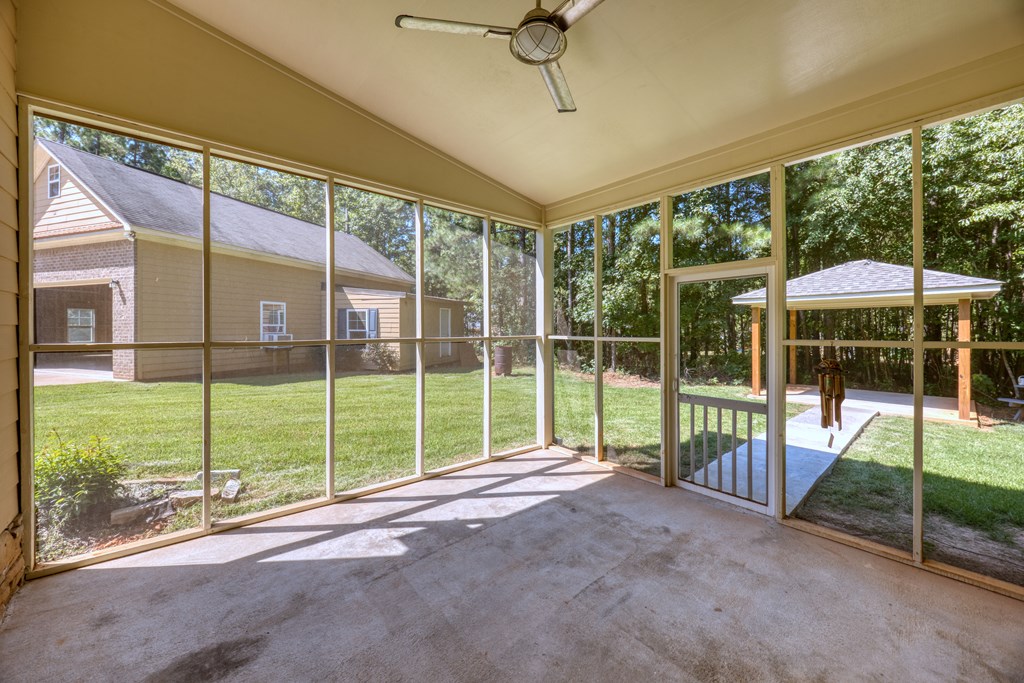 182 Oak Ridge Drive Waverly Hall, GA 31831 - Photo 11 of 40 a view of a yard with porch and a patio