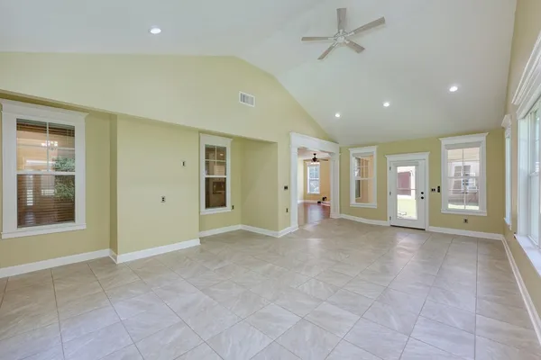 a view of a livingroom with a kitchen