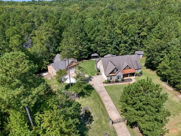 an aerial view of a house with a garden