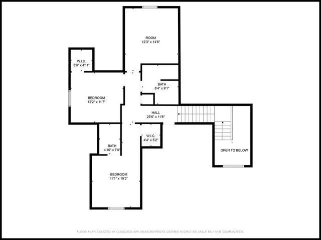a black white and white photo of a floor plan