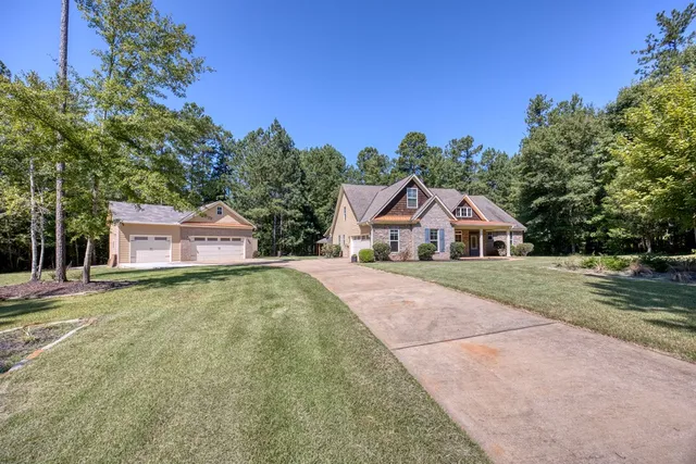 a house with trees in front of it