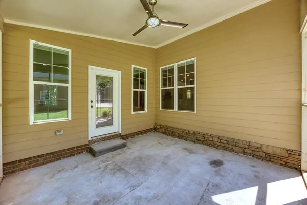 an empty room with windows