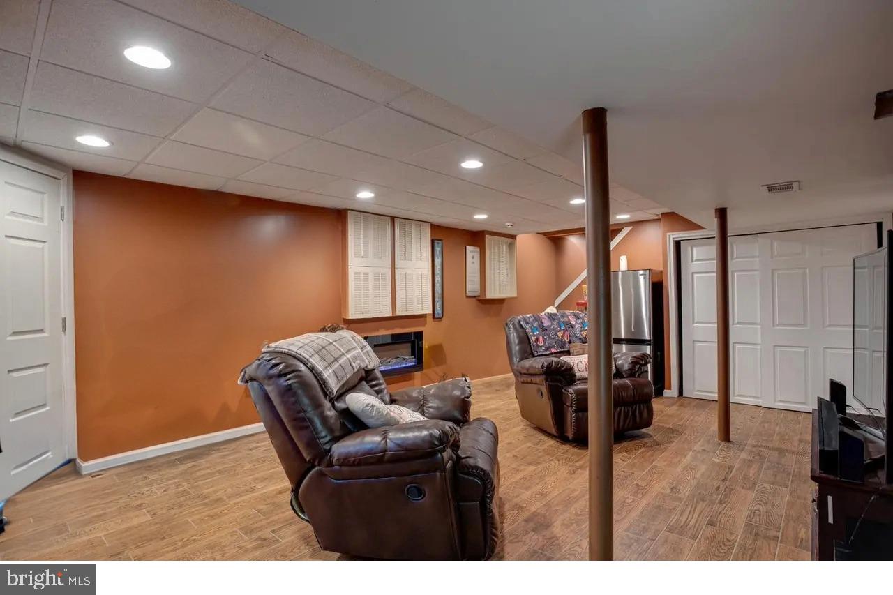 515 West Ring Factory Road Bel Air, MD 21015 - Photo 20 of 25 Cozy basement retreat with warm tones.