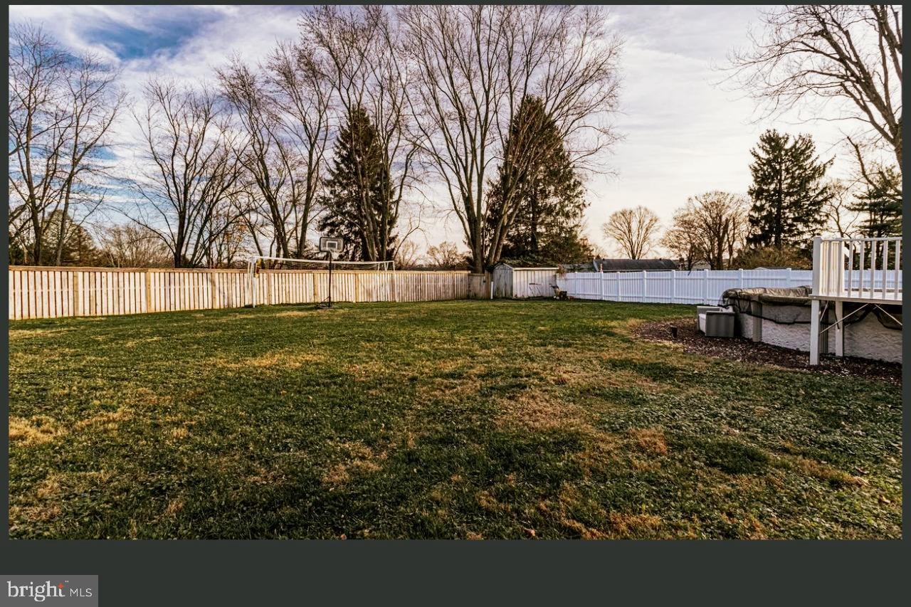 515 West Ring Factory Road Bel Air, MD 21015 - Photo 25 of 25 Spacious backyard with serene tree line.