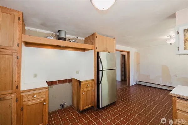 a view of a storage & utility room with empty racks