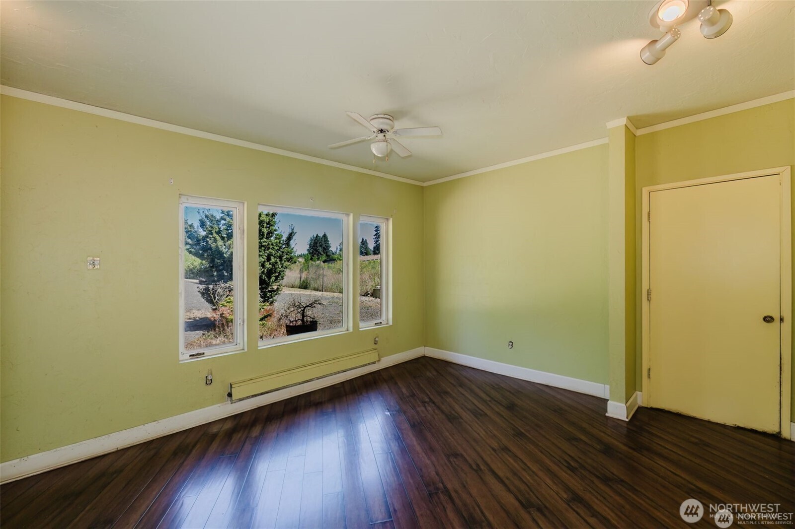 1783 West Shelton Matlock Road Shelton, WA 98584 - Photo 15 of 40 an empty room with wooden floor and windows