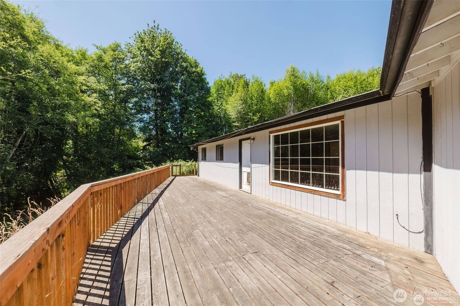 1783 West Shelton Matlock Road Shelton, WA 98584 - Photo 33 of 40 a view of house with backyard and deck