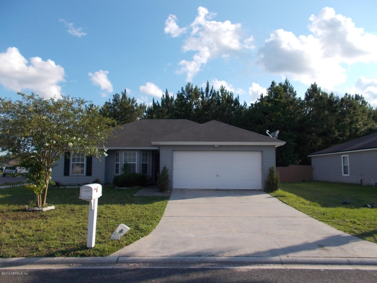 8684 Springtree Road Jacksonville, FL 32210 - Photo 1 of 26 Front
