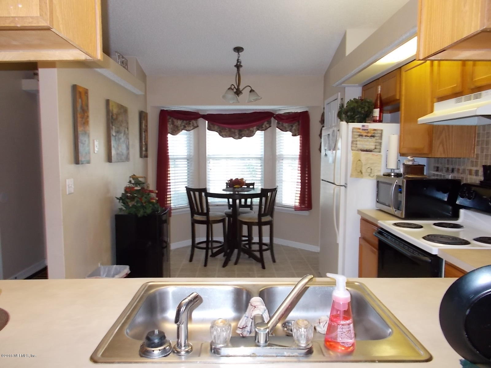 8684 Springtree Road Jacksonville, FL 32210 - Photo 14 of 26 Kitchen to Nook