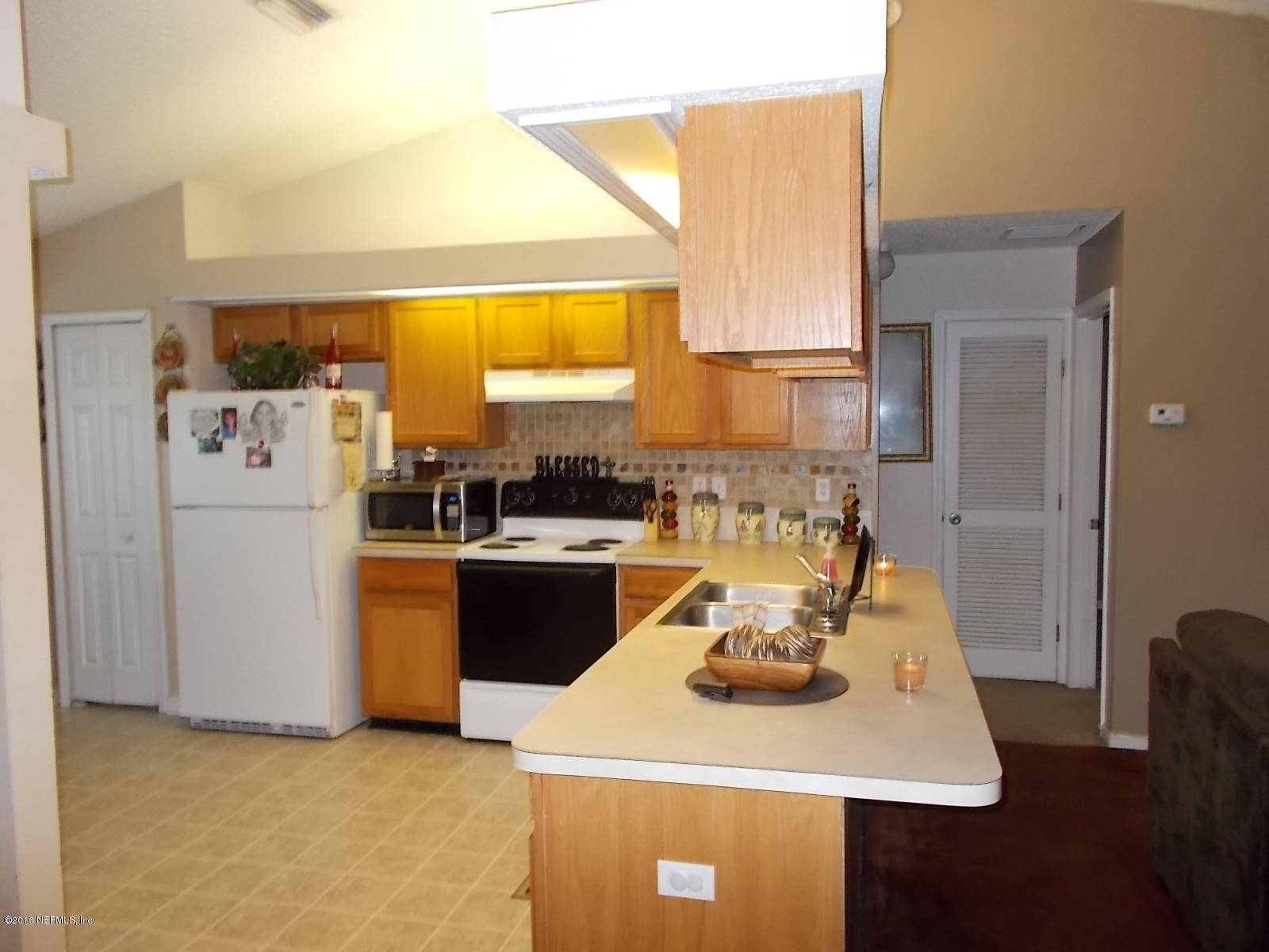 8684 Springtree Road Jacksonville, FL 32210 - Photo 15 of 26 Kitchen