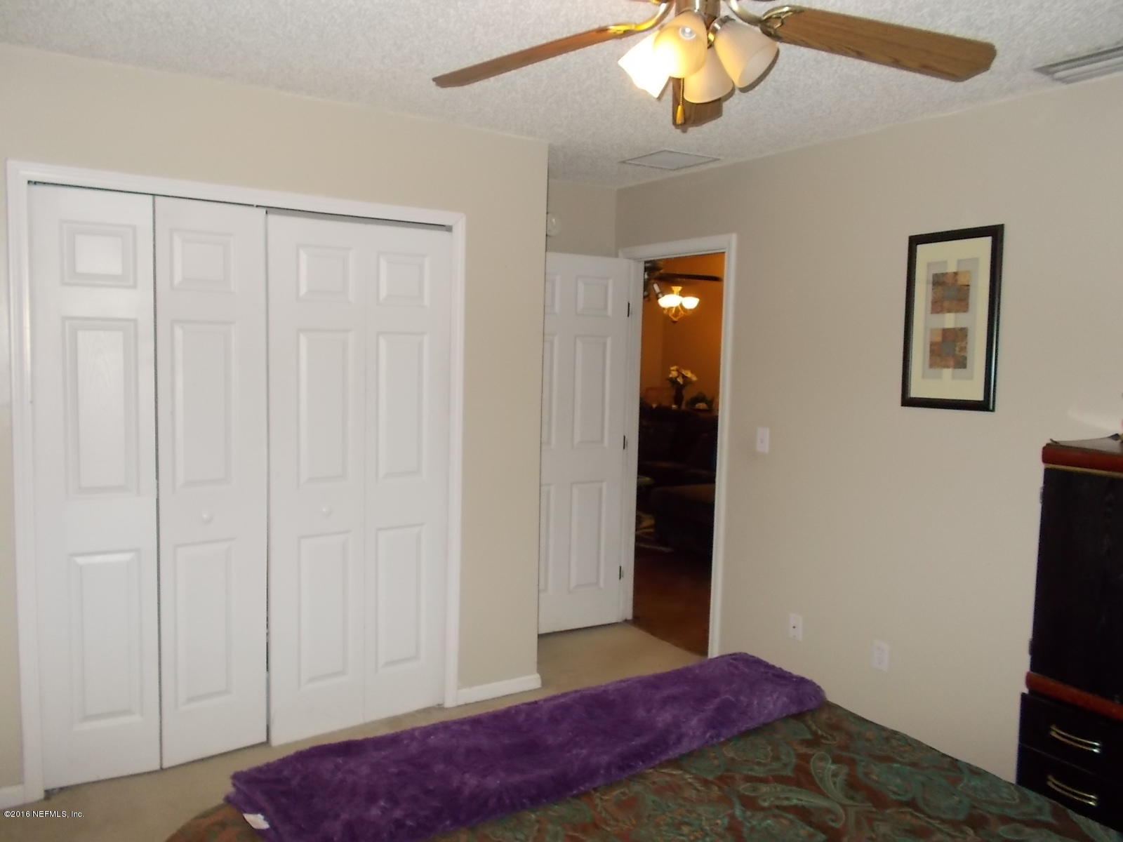 8684 Springtree Road Jacksonville, FL 32210 - Photo 23 of 26 Bedroom 2nd view