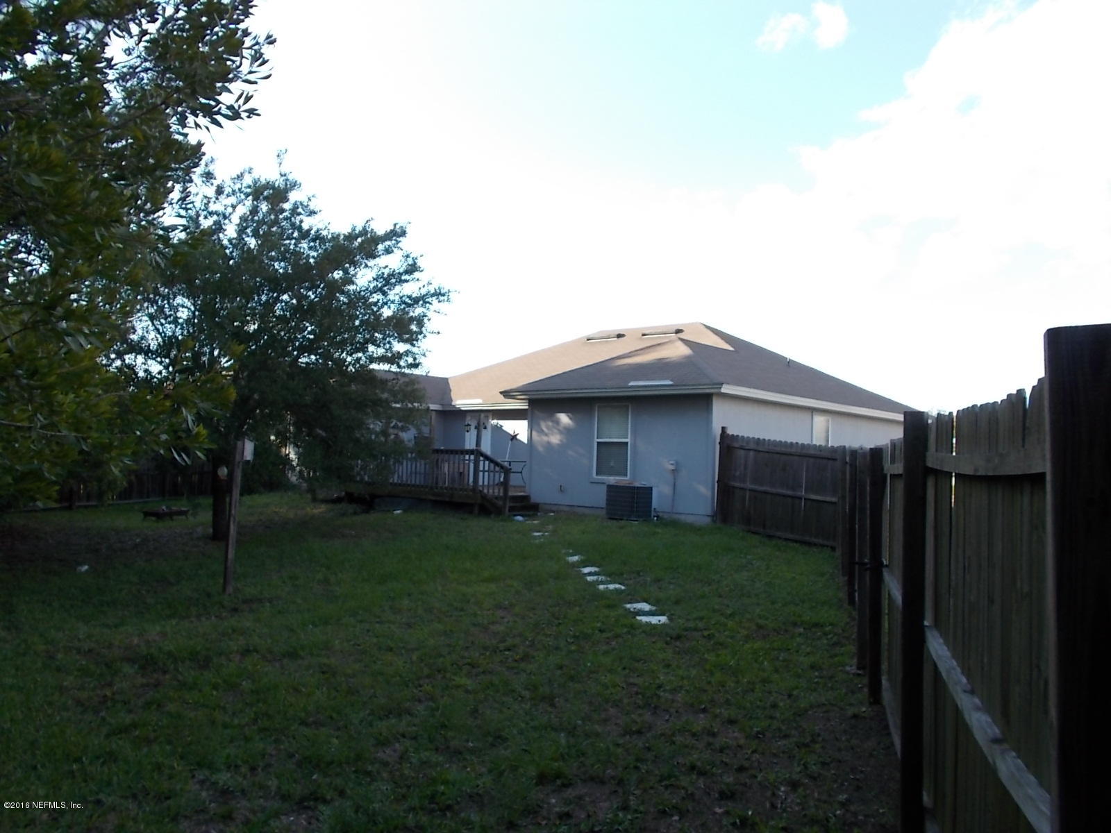 8684 Springtree Road Jacksonville, FL 32210 - Photo 3 of 26 Rear Yard