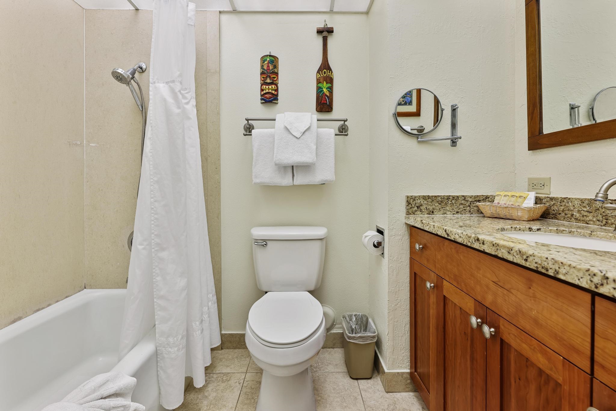3445 Lower Honoapiilani Road, Unit 151 Lahaina, HI 96761 - Photo 14 of 42 a bathroom with a granite countertop sink toilet and shower