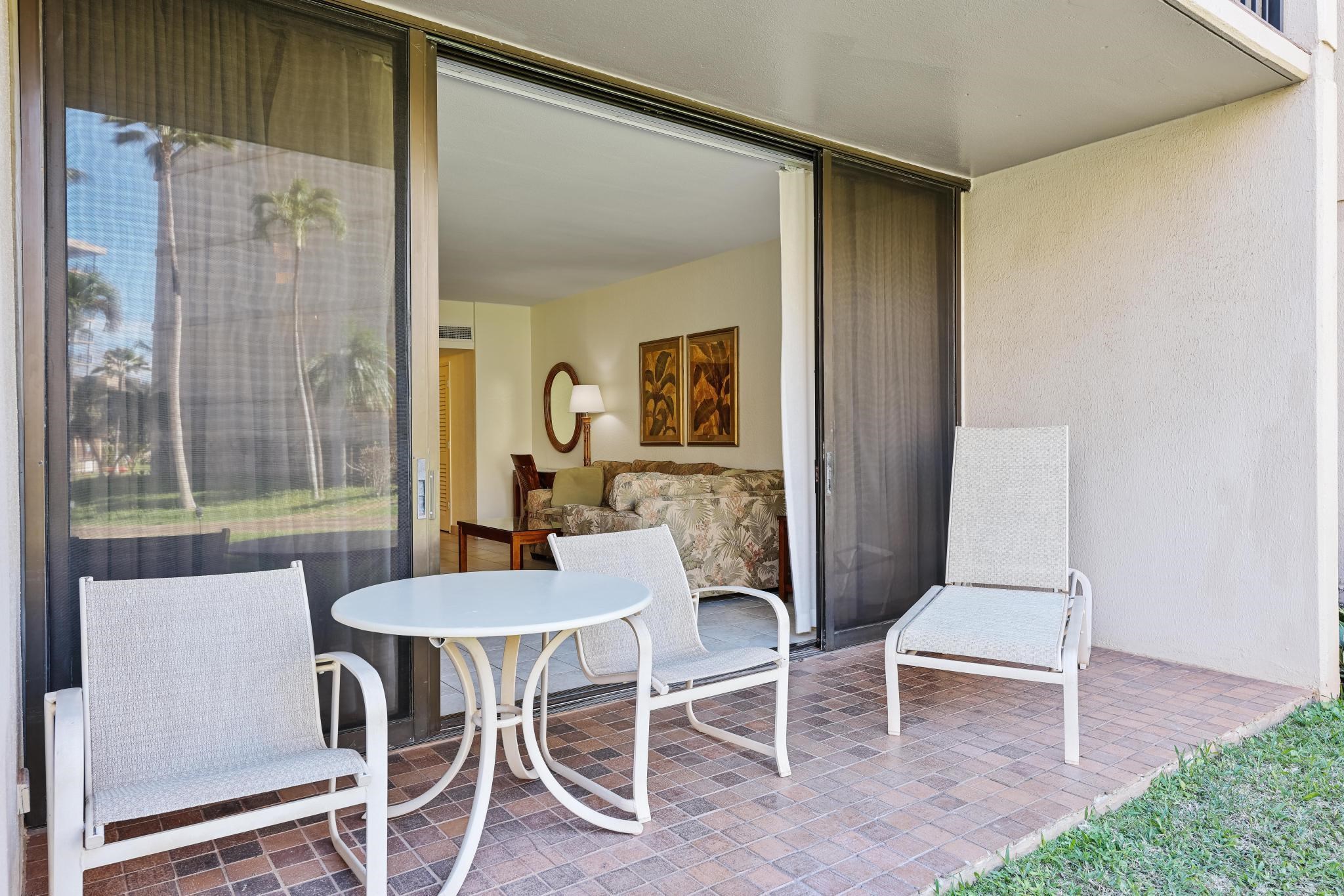 3445 Lower Honoapiilani Road, Unit 151 Lahaina, HI 96761 - Photo 3 of 42 a view of a dining room with furniture and wooden floor