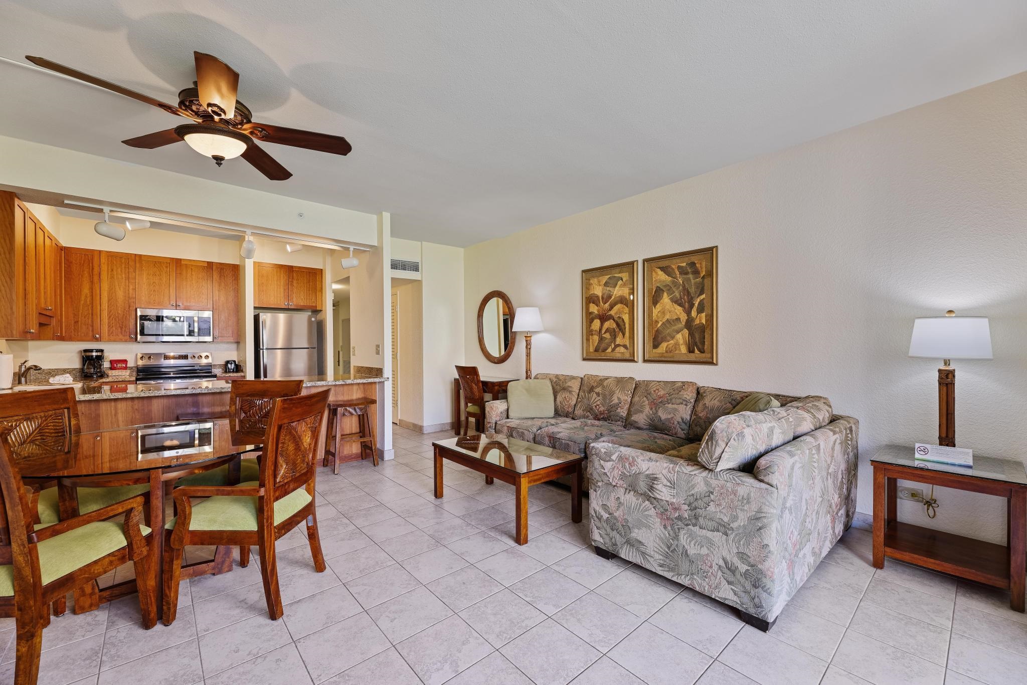 3445 Lower Honoapiilani Road, Unit 151 Lahaina, HI 96761 - Photo 7 of 42 a living room with furniture and a window