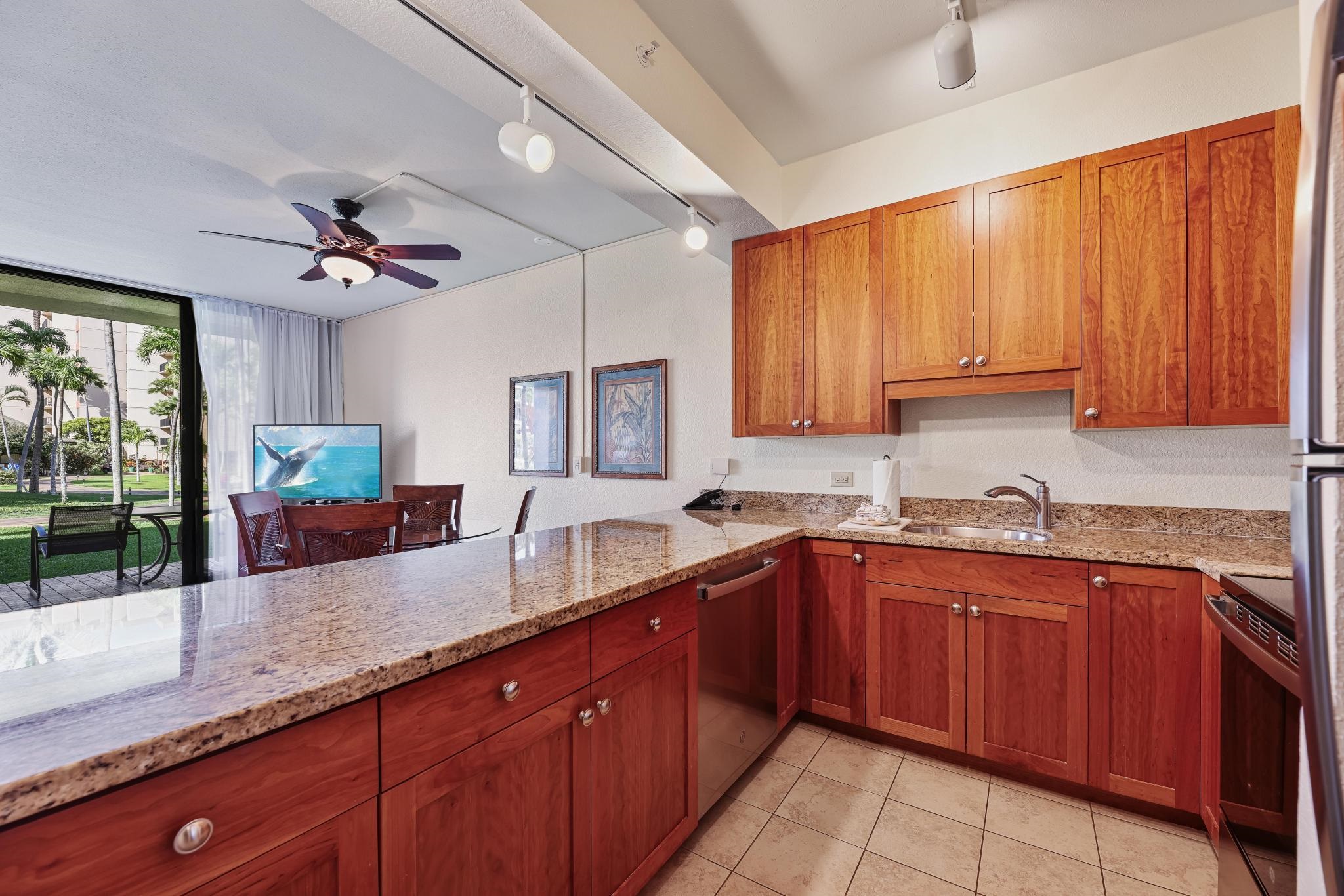 3445 Lower Honoapiilani Road, Unit 151 Lahaina, HI 96761 - Photo 8 of 42 a kitchen with lots of counter space and a sink