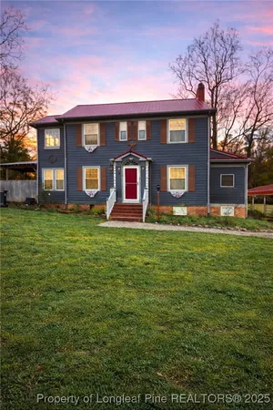 a front view of a building with garden