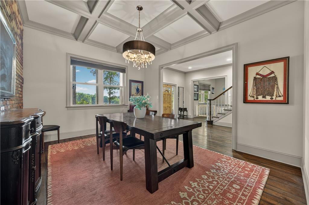 632 Geiger Road Jefferson, GA 30549 - Photo 11 of 55 a view of a dining room with furniture window and wooden floor