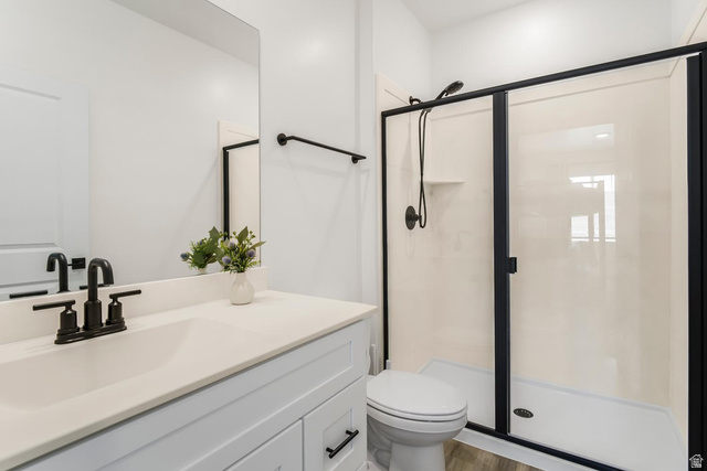 1705 Ripple Rock Drive, Unit 3017 Washington, UT 84780 - Photo 9 of 22 White vanity featuring a white countertop and rectangular sink with a matte black faucet