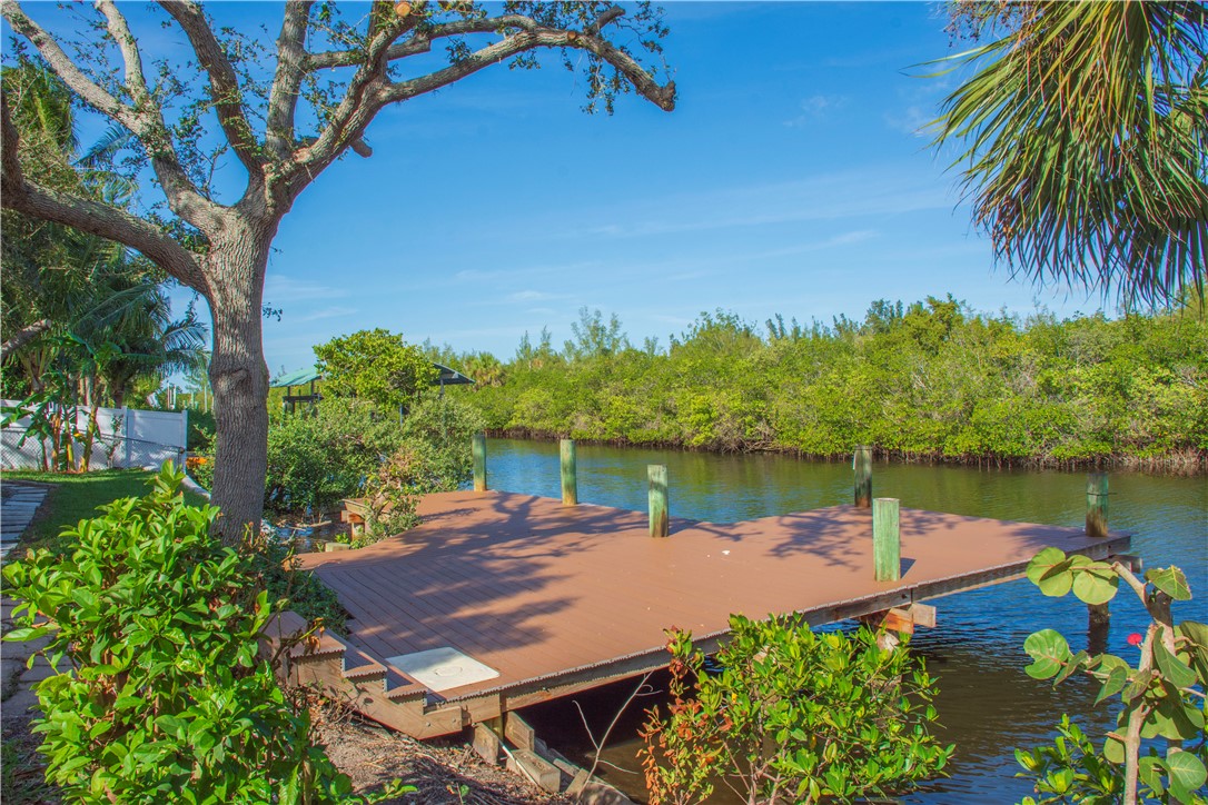 a view of a lake with a yard