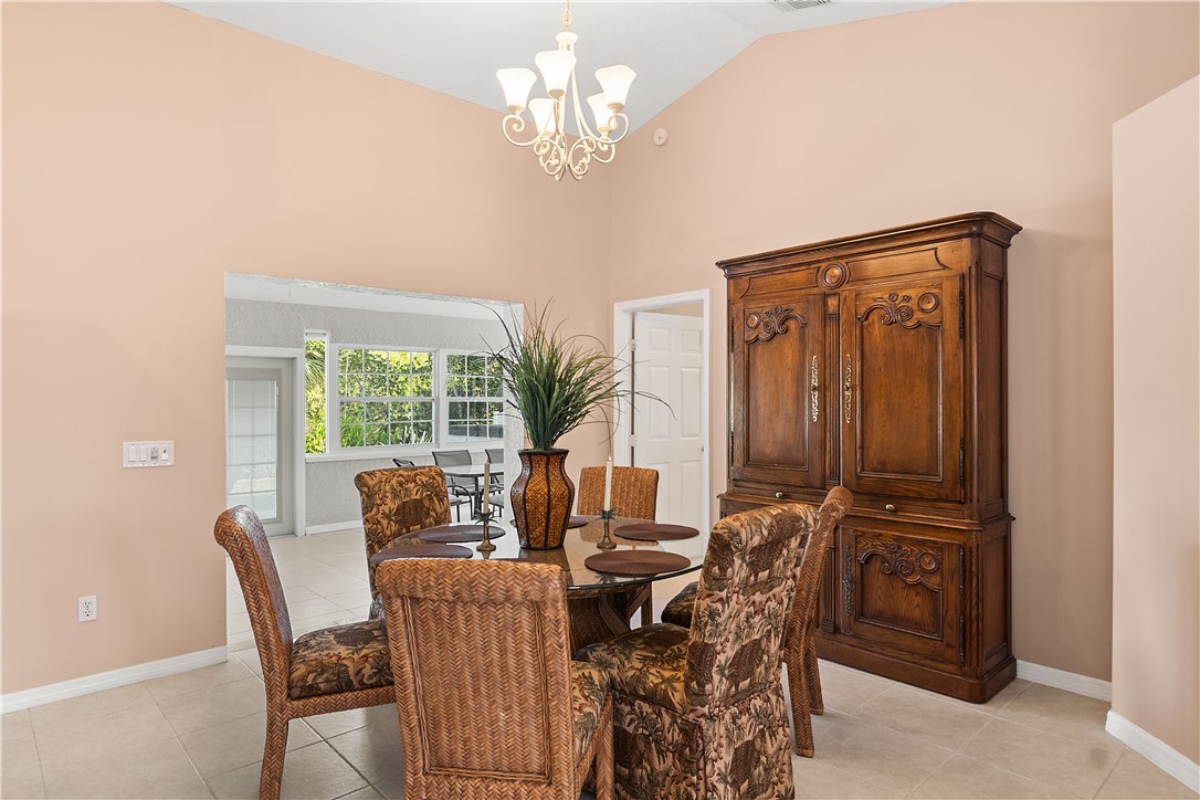 922 Jackson Way Fort Pierce, FL 34949 - Photo 15 of 34 a view of a dining room with furniture window and outside view
