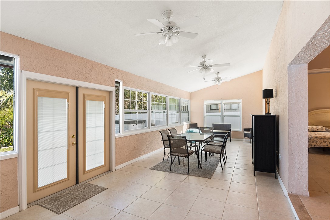 922 Jackson Way Fort Pierce, FL 34949 - Photo 16 of 34 a dining room with furniture and window