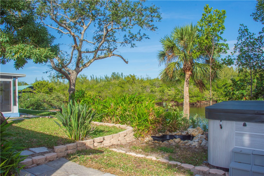 922 Jackson Way Fort Pierce, FL 34949 - Photo 3 of 34 a view of a backyard with plants