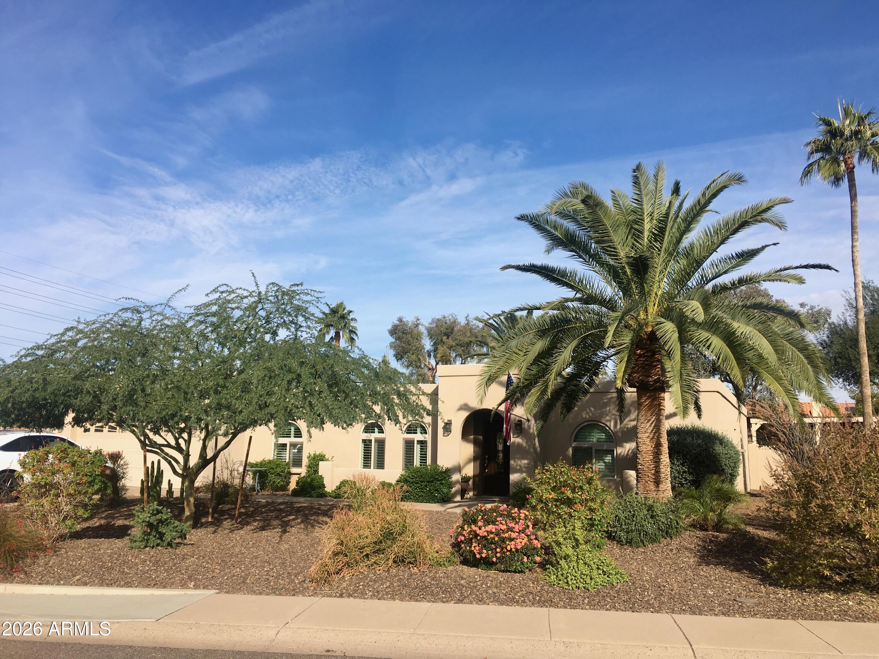 5610 East Justine Road Scottsdale, AZ 85254 - Photo 2 of 28 a view of a house with a street