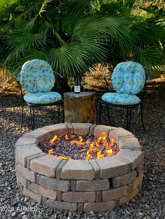 a view of outdoor sitting area with furniture