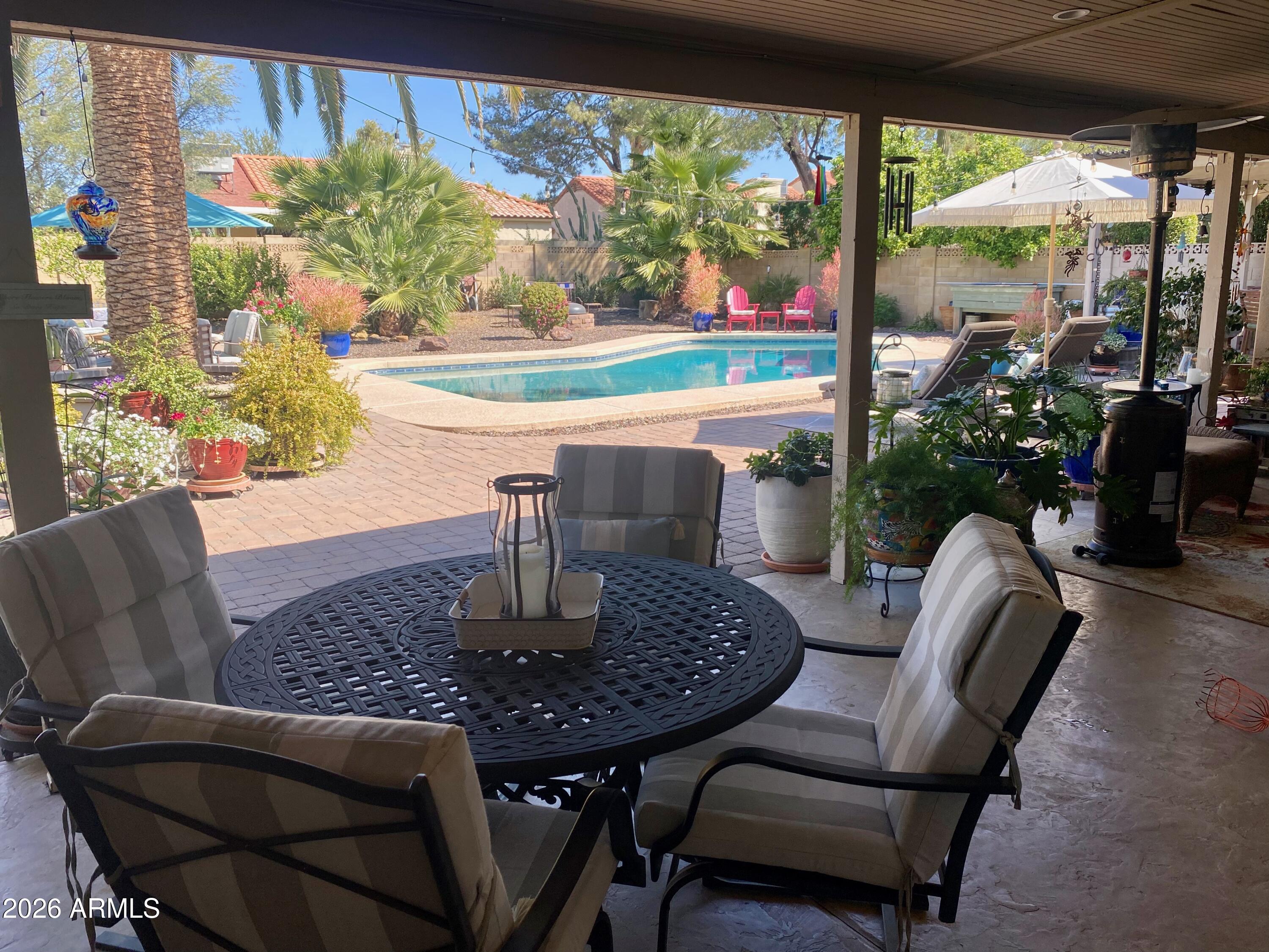 5610 East Justine Road Scottsdale, AZ 85254 - Photo 27 of 28 a view of a dining room with furniture window and outside view