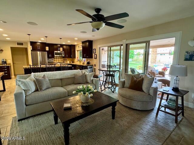 5610 East Justine Road Scottsdale, AZ 85254 - Photo 5 of 28 a living room with furniture and a large window
