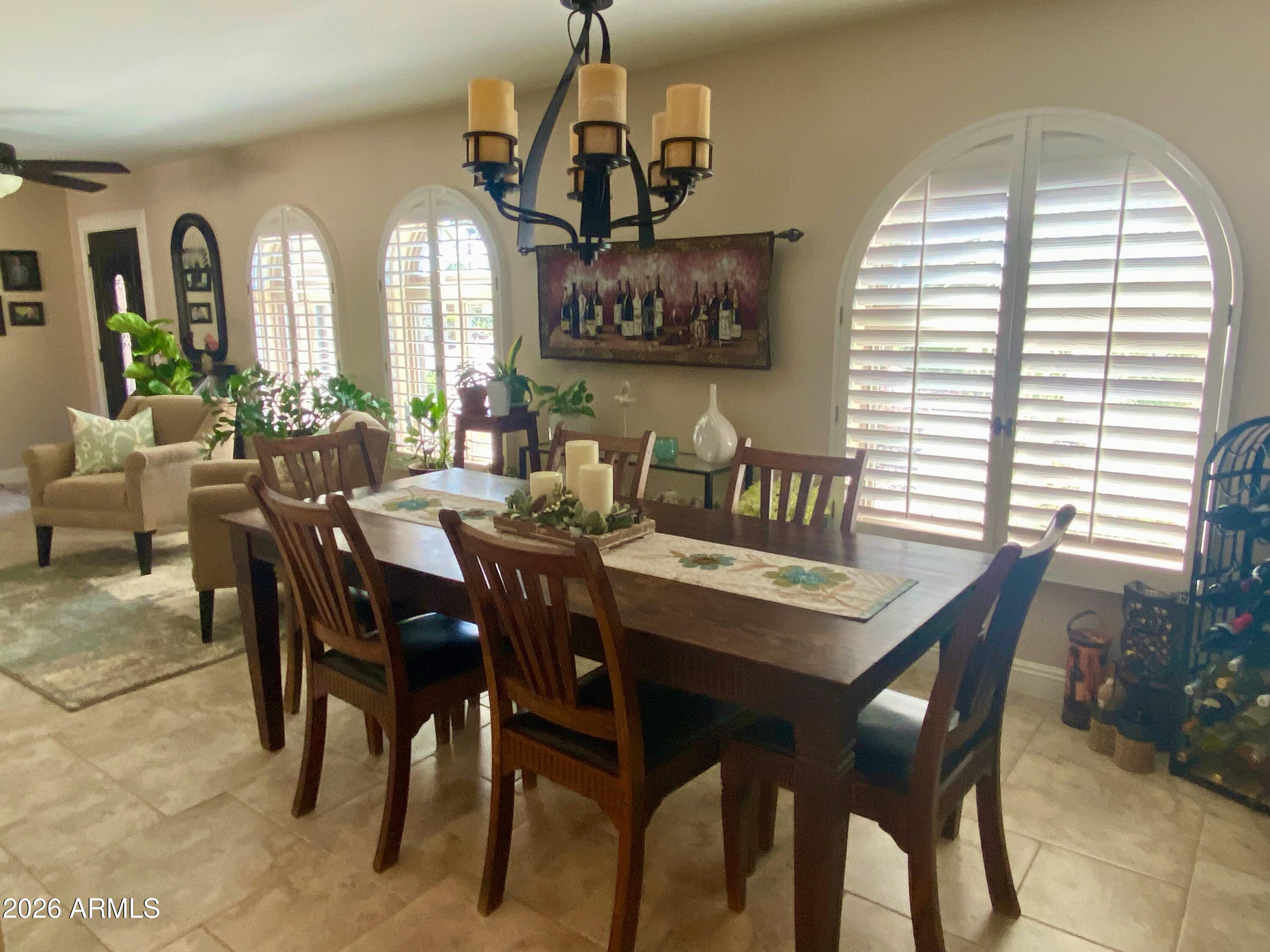 5610 East Justine Road Scottsdale, AZ 85254 - Photo 7 of 28 a view of a dining room with furniture and window