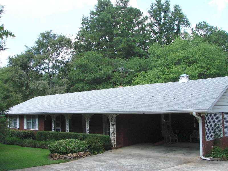 Exterior Front. Custom built 4-sided Brick Ranch with basement apartment