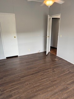 479 Cal Durham Road Bethpage, TN 37022 - Photo 13 of 19 an empty room with wooden floor and door
