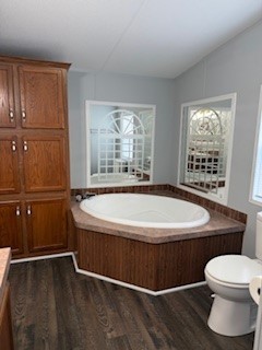 479 Cal Durham Road Bethpage, TN 37022 - Photo 17 of 19 a bathroom with a toilet a sink and a window