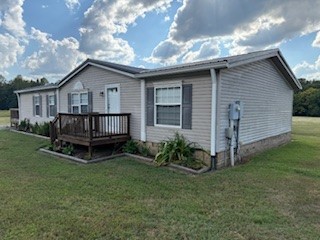 479 Cal Durham Road Bethpage, TN 37022 - Photo 3 of 19 a view of a house with a yard and wooden fence