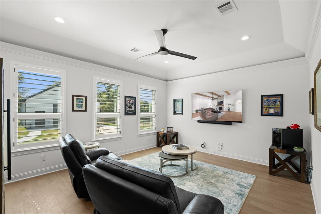 2012 Southern Rise Court Granbury, TX 76049 - Photo 22 of 40 a living room with furniture and a window