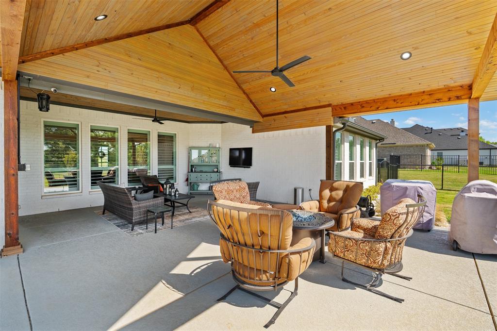 2012 Southern Rise Court Granbury, TX 76049 - Photo 28 of 40 a view of a patio with table and chairs and potted plants