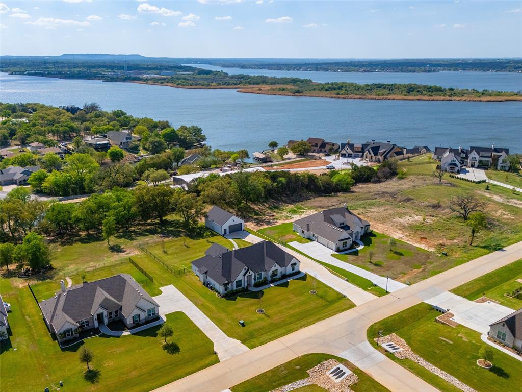 2012 Southern Rise Court Granbury, TX 76049 - Photo 39 of 40 an aerial view of a house with a swimming pool yard and outdoor seating