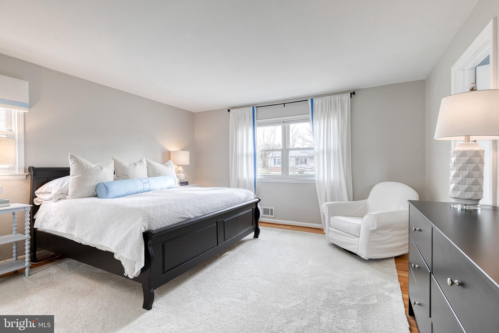 8206 Burnley Road Towson, MD 21204 - Photo 16 of 37 a spacious bedroom with a bed and a window