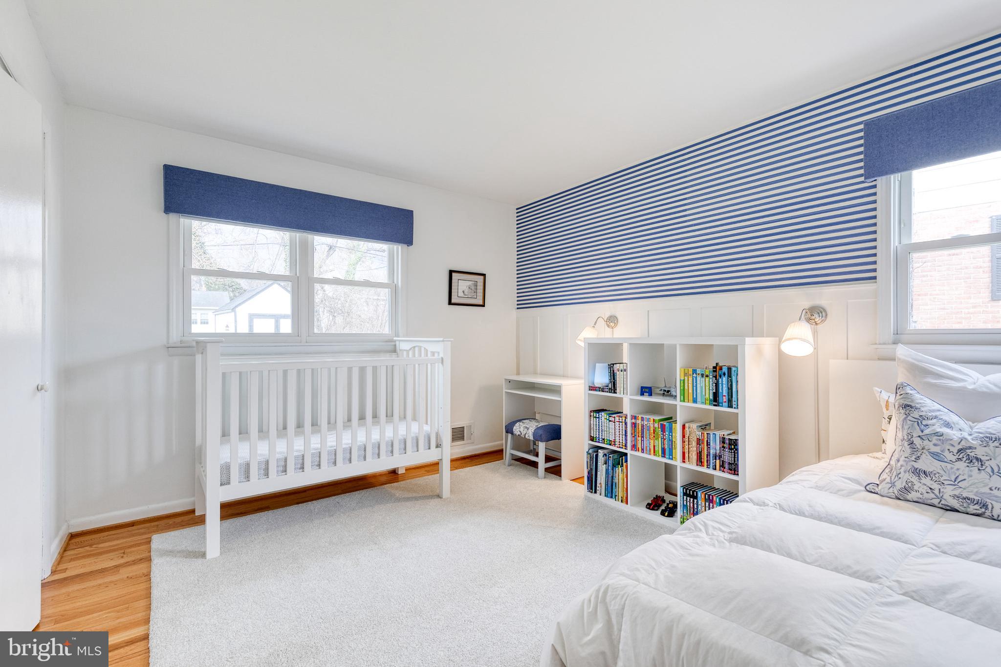 8206 Burnley Road Towson, MD 21204 - Photo 21 of 37 a bed room with a bed and a window