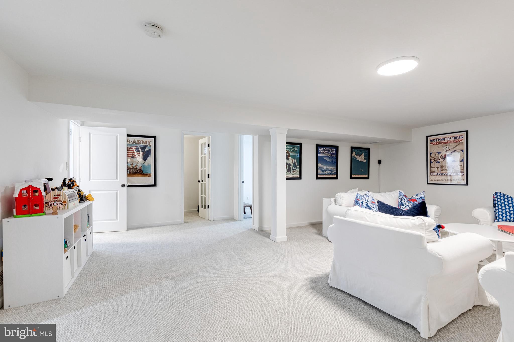 8206 Burnley Road Towson, MD 21204 - Photo 24 of 37 a living room with furniture and a window