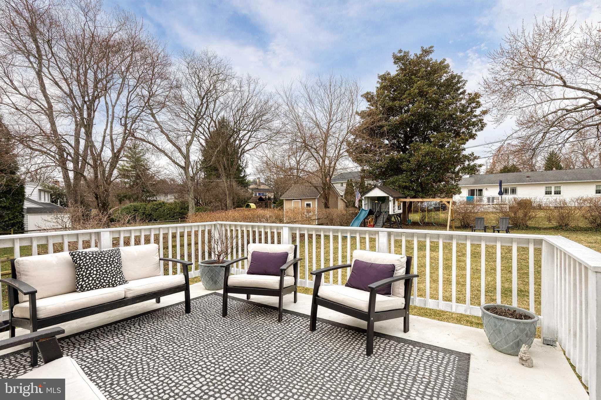 8206 Burnley Road Towson, MD 21204 - Photo 35 of 37 a view of a with couches and a table and chairs