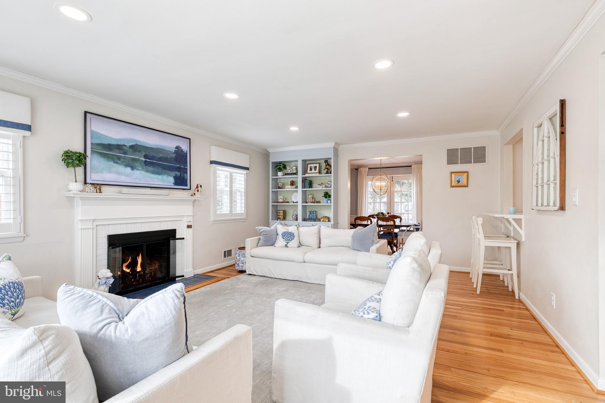 8206 Burnley Road Towson, MD 21204 - Photo 7 of 37 a living room with furniture and a fireplace