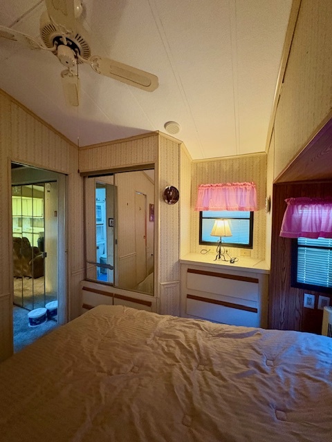 4-20 Woodhaven Sublette, IL 61367 - Photo 22 of 26 a bedroom with furniture and a flat screen tv