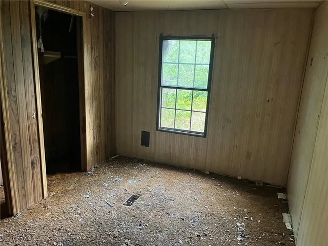 an empty room with windows